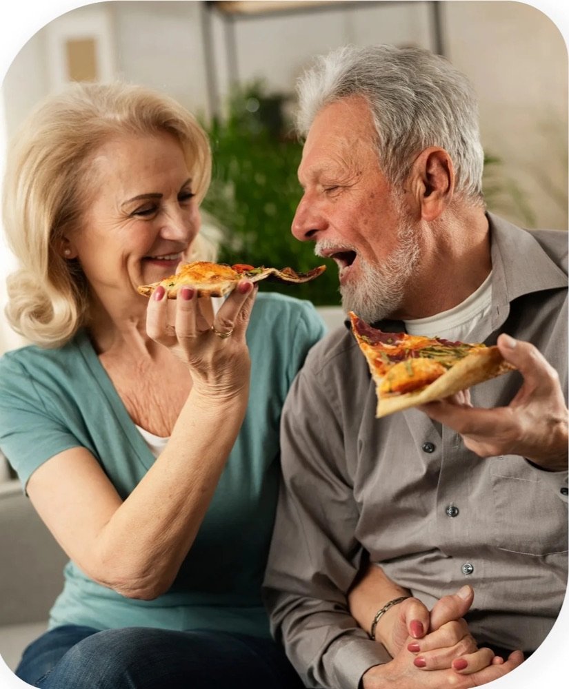 Couple enjoying pizza
