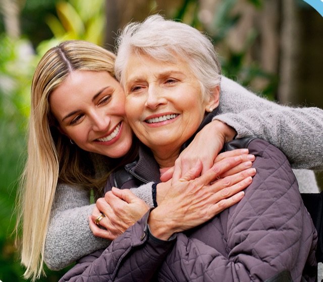 Patient hugging her granddaughter