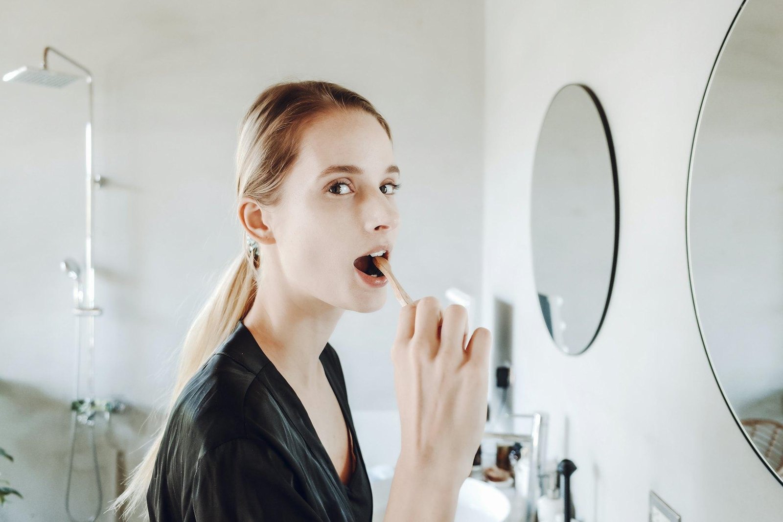Woman brushing her teeth